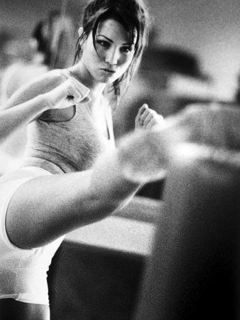 young-woman-exercising-in-a-gym